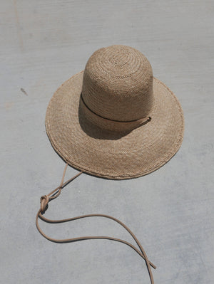 
                  
                    The Bell Hat
                  
                