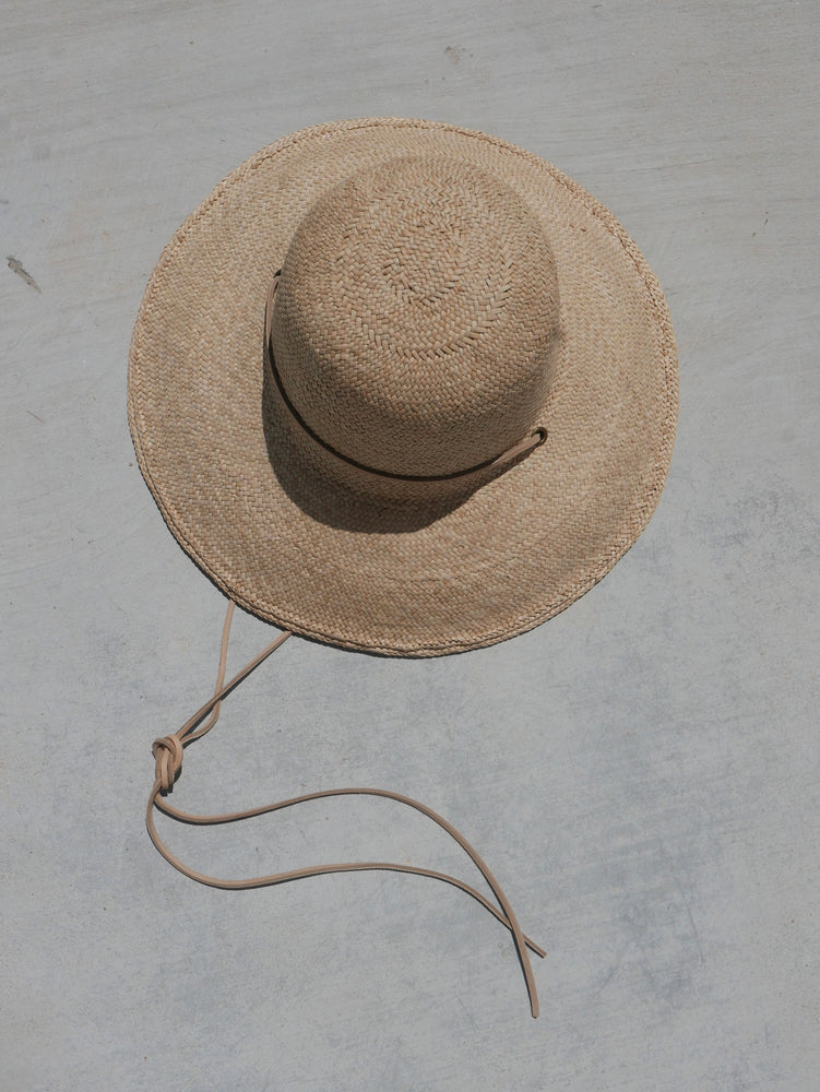 
                  
                    The Bell Hat
                  
                